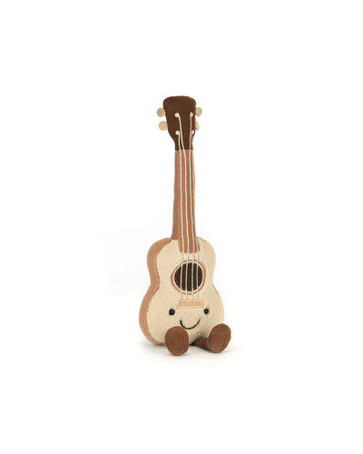 The Jellycat Amuseables Ukulele is a plush toy shaped like a ukulele with a smiling face and round feet in beige and brown tones—perfect for beach parties or cozy playtime. It sits upright on a white background for extra charm.