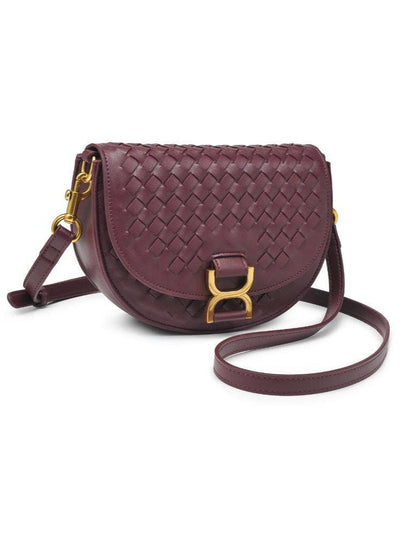 A stylish crossbody bag in deep burgundy featuring a woven design on the front flap. The bag is accented with gold-tone hardware, including a buckle detail and adjustable strap clasps. It has a curved shape with a detachable and adjustable strap for versatile wear.