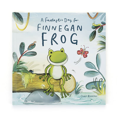 Introducing the "Jellycat A Fantastic Day for Finnegan Frog Book" by Clair Rossiter – an enchanting illustrated children's book featuring a cheerful frog perched on a log by the water. This delightful bedtime story, adorned with leaves, a butterfly, and a bird, is perfect for sparking little ones' imaginations.