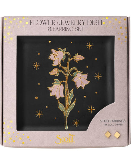 The Jewelry Dish & Stud Earring Set - Flower/Black features a ceramic dish with a gold and pink floral design, gold stars, and 14k gold-plated floral stud earrings, beautifully presented in a pink box for an elegant touch.