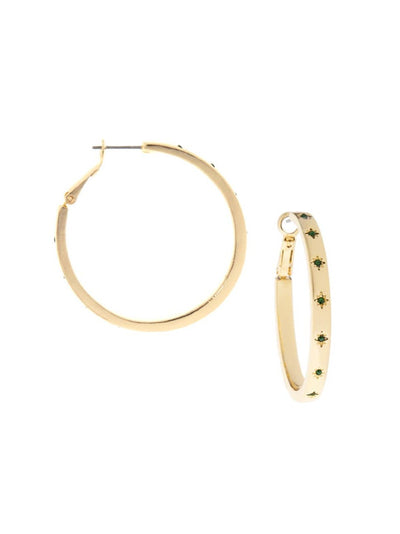 Unveil the captivating charm of the Crystal Starburst Hoop: Gold Emerald earrings, featuring one closed hoop and one open, both embellished with small green gemstones that offer a celestial sparkle. Their vintage-inspired design adds a touch of magic to any outfit.